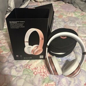 Beats like new, rose gold and white,, box and case, no holes stains!